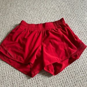 lululemon low rise hotty hot shorts 4 inch, size 4, color dark red